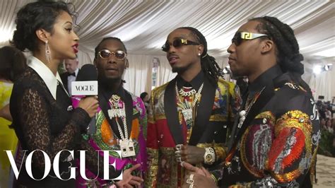 Watch Migos on Their Matching Versace Suits 